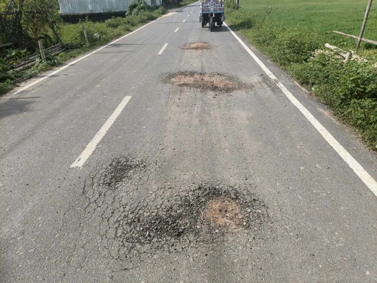 নাইক্ষ্যংছড়িতে ৩ কোটি টাকার কাজ প্রশ্নবিদ্ধ, সড়কের কার্পেটিং উঠে গর্তে পরিণত